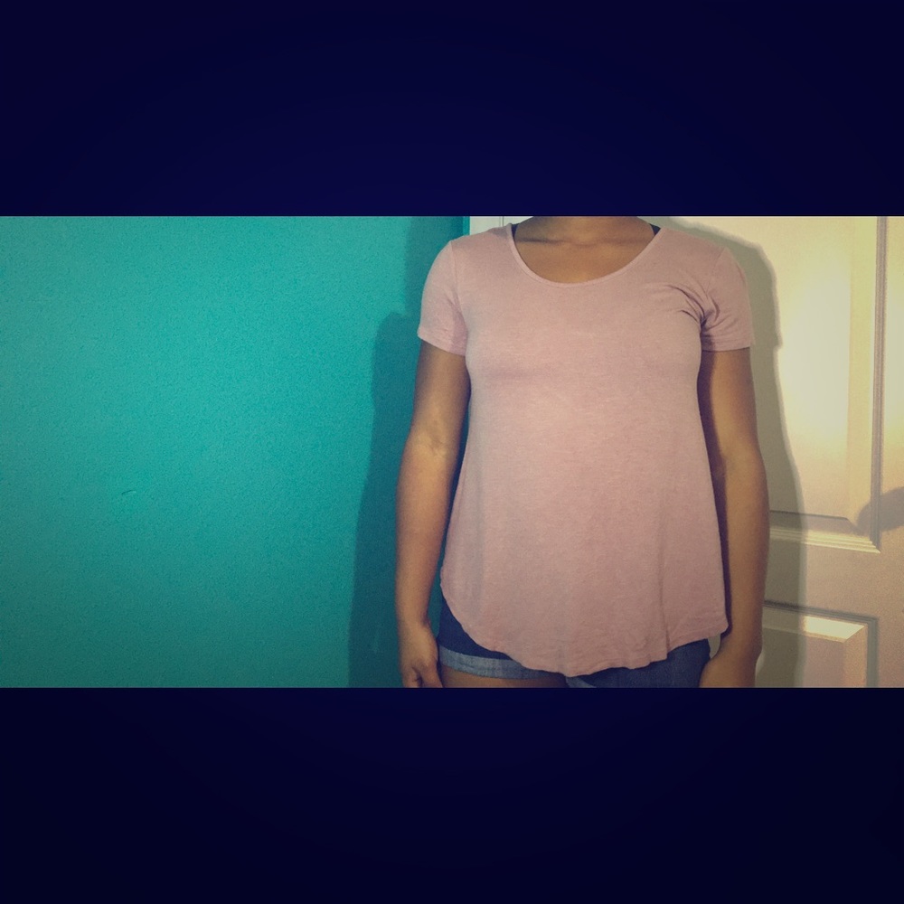Pink shirt with criss cross back opening